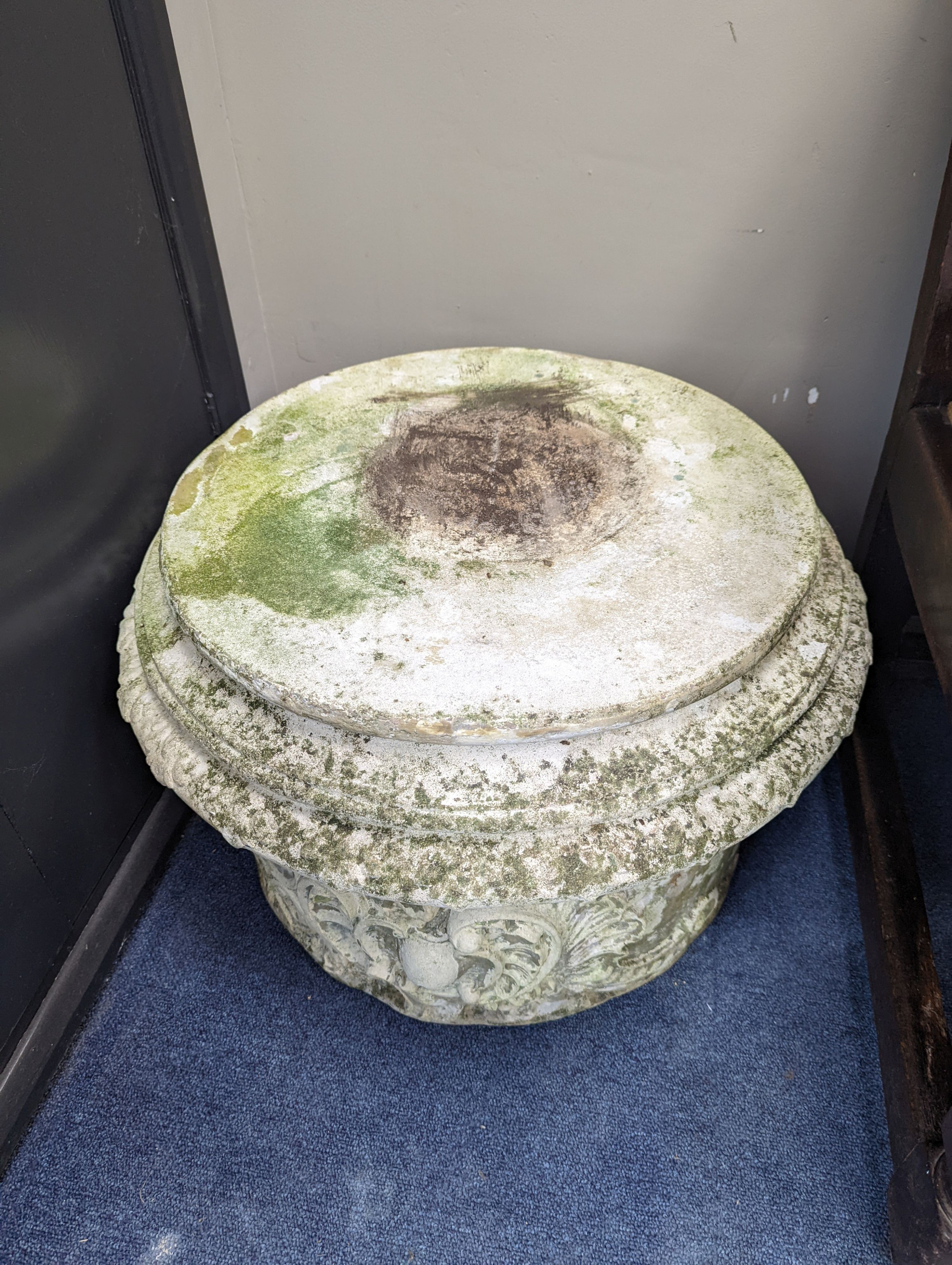 A pair of reconstituted stone circular garden plinths, diameter 60cm, height 38cm